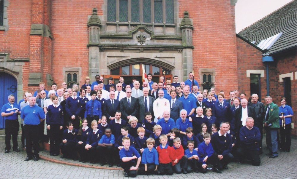 BB centernary group photo outside the church